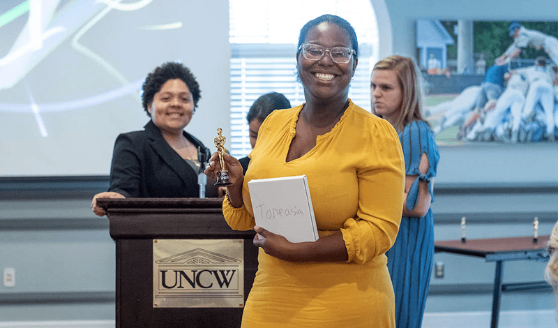 Woman with award