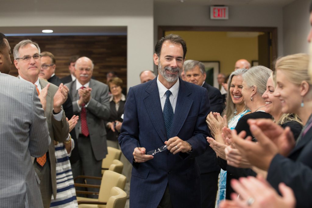 Dr. Bahr receives applause from the meeting attendees.